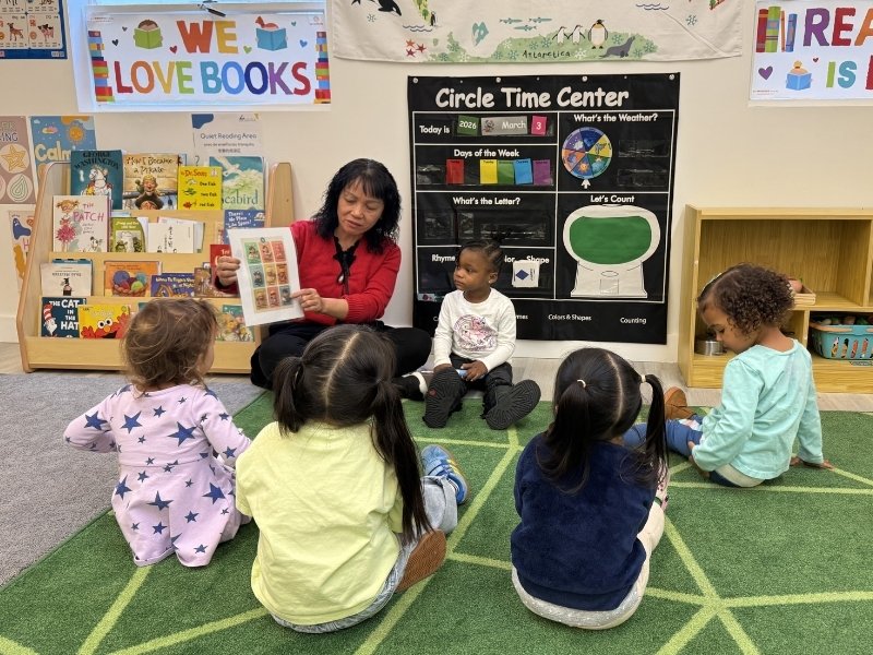 teacher leading circle time at bilingual preschool in hayes valley san francisco